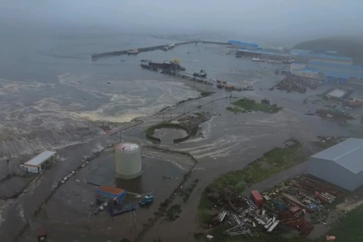 This image, taken from a video released by Geophysical Service of the Russian Academy of Sciences, shows the aftermath of a tsunami hitting the coastal area of Severo-Kurilsk at Paramushir island of the Kuril Islands in Russia on Wednesday.