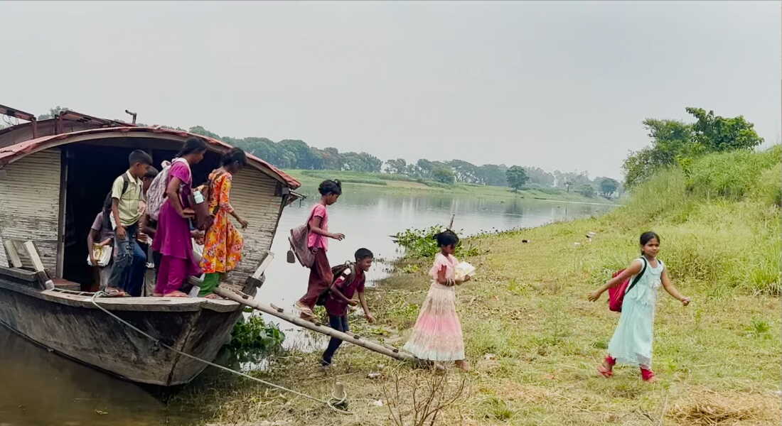 Students head home after class ends at the floating school.