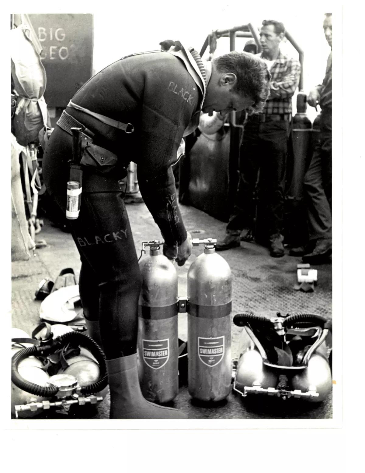 Aquanaut Richard 'Blackie' Blackburn preparing for a dive.