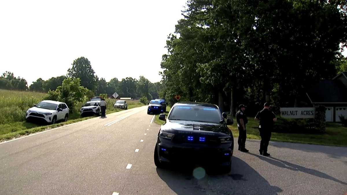 In this image taken from WSOC video, various police vehicles gather outside a community after a mass shooting, Sunday, June 1, 2025, in Hickory, a city in Catawba County, N.C.