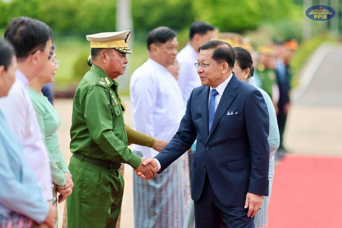 In this photo released by Myanmar President Office, Myanmar President Min Aung Hlaing, right, shakes hands with Commander-in-Chief Gen. Ye Win Oo, left, upon his departure to Vietnam, at the Naypyitaw international airport Friday, Sept. 4, 2026, in Naypyitaw, Myanmar.