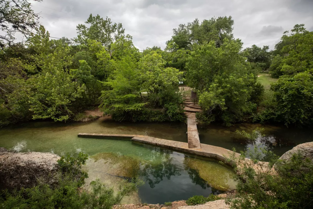 An archival photo of Jacob's Well shows the artesian spring full of water on June 4, 2021. It closed to swimming the following summer and hasn't reopened.