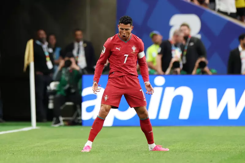 Cristiano Ronaldo of Portugal celebrates scoring his first of two World Cup goals against Uzbekistan. He becomes the first player to score in six World Cups.