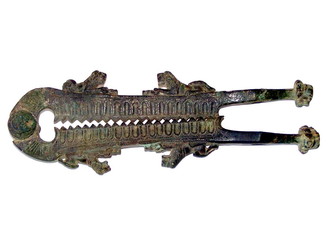 One of Arlene Wagner's most prized acquisitions is a bronze device forged sometime between 200 B.C. and 200 A.D. It had been buried for centuries somewhere between Rome and Naples and was unearthed in the 1960s, according to the antiques dealer who acquired it for the Wagners. The small tool measures 12 inches and is decorated with lion designs.