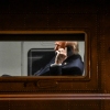 President Trump uses a cell phone aboard his Marine One helicopter in Leesburg, Va., on April 24, 2025.