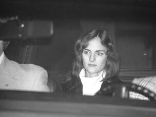 Patty Hearst is seated in a U.S. Marshal's car, leaving the San Mateo County jail in Redwood City, Calif., on Dec. 12, 1975, on her way to San Francisco to an appearance in federal court. Hearst, the granddaughter of newspaper publisher and politician William Randolph Hearst, was tried and convicted on bank robbery charges in 1976, which were later commuted by President Jimmy Carter.