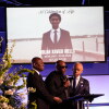 Grand jury finds no evidence of criminal conduct in the death of Nolan Wells : NPR 3 Elmore Wonsley, center, speaks next to attorney Ben Crump, left, and Rev. Al Sharpton during a memorial service for Nolan Xavier Wells on Monday.