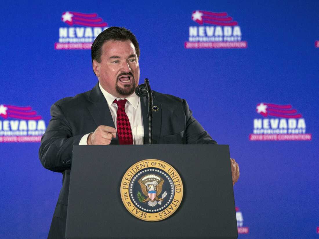 FILE - Nevada State GOP Chairman Michael McDonald announces President Donald Trump before he speaks at the Nevada Republican Party Convention, June 23, 2018, in Las Vegas. A Nevada state court judge dismissed a criminal indictment Friday, June 21, 2024, against six Republicans accused of submitting certificates to Congress falsely declaring Donald Trump the winner of the state’s 2020 presidential election. (AP Photo/L.E. Baskow, File)