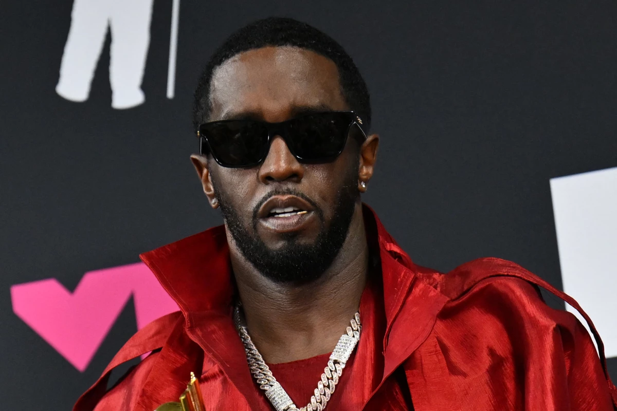 US producer-musician Sean 'Diddy' Combs poses with the Global Icon award in the press room during the MTV Video Music Awards at the Prudential Center in Newark, New Jersey, on September 12, 2023.
