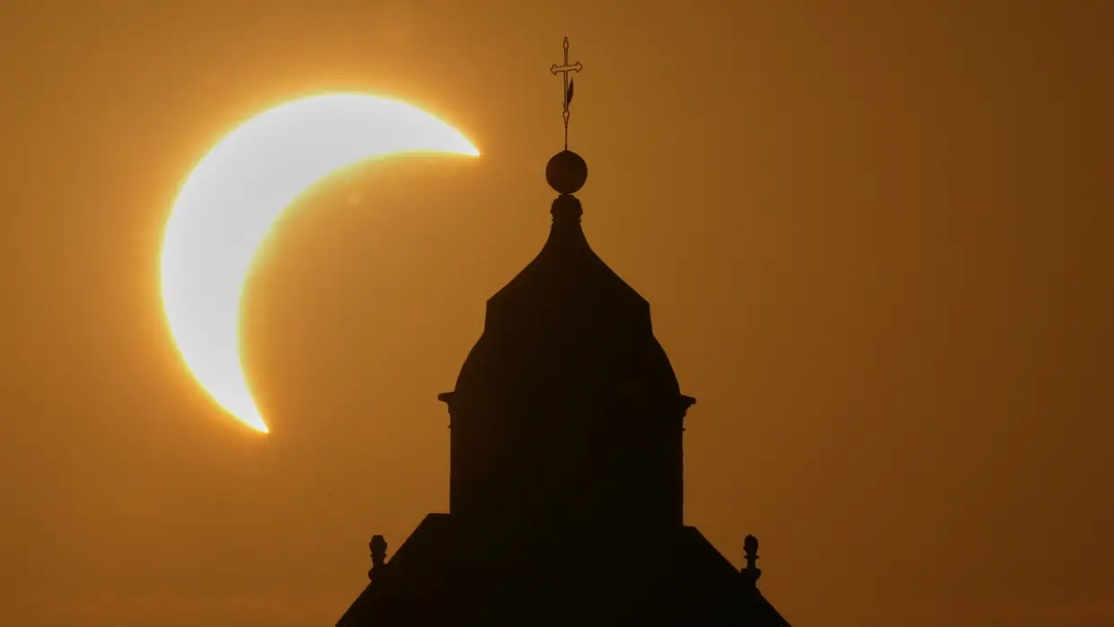 Millions crowd cities to see Spain's first total solar eclipse in over a century