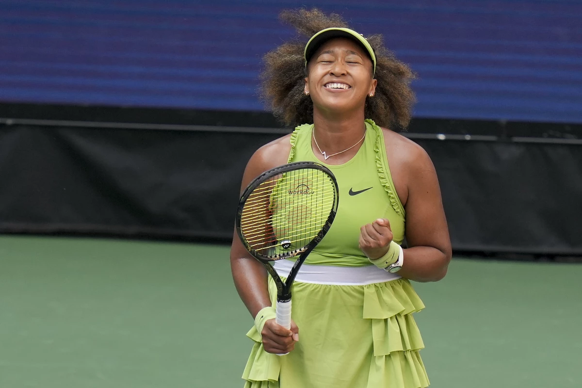 Naomi Osaka of Japan reacts after defeating Jelena Ostapenko, of Latvia, during the first round of the U.S. Open tennis championships, Tuesday, Aug. 27, 2024, in New York.