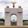A mockup of President Donald Trump's proposed triumphal arch stands at the Great American State Fair on the National Mall, June 27, 2026, in Washington.