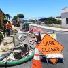 A roadworks crew works in Monterey Park, California on June 24, 2021.