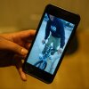 Juan plays a video of his son Carlos riding a bike, which Carlos purchased the day before being taken into custody, at his home in Cedar Park, Texas, on Jan. 29, 2025.