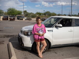 Tara Gentner stands next to the car she inherited from her mother, Sheri Petty. Petty died last summer after exposure to extreme heat. Gentner found her mother passed out on the floor of their manufactured home in sweltering July temperatures.