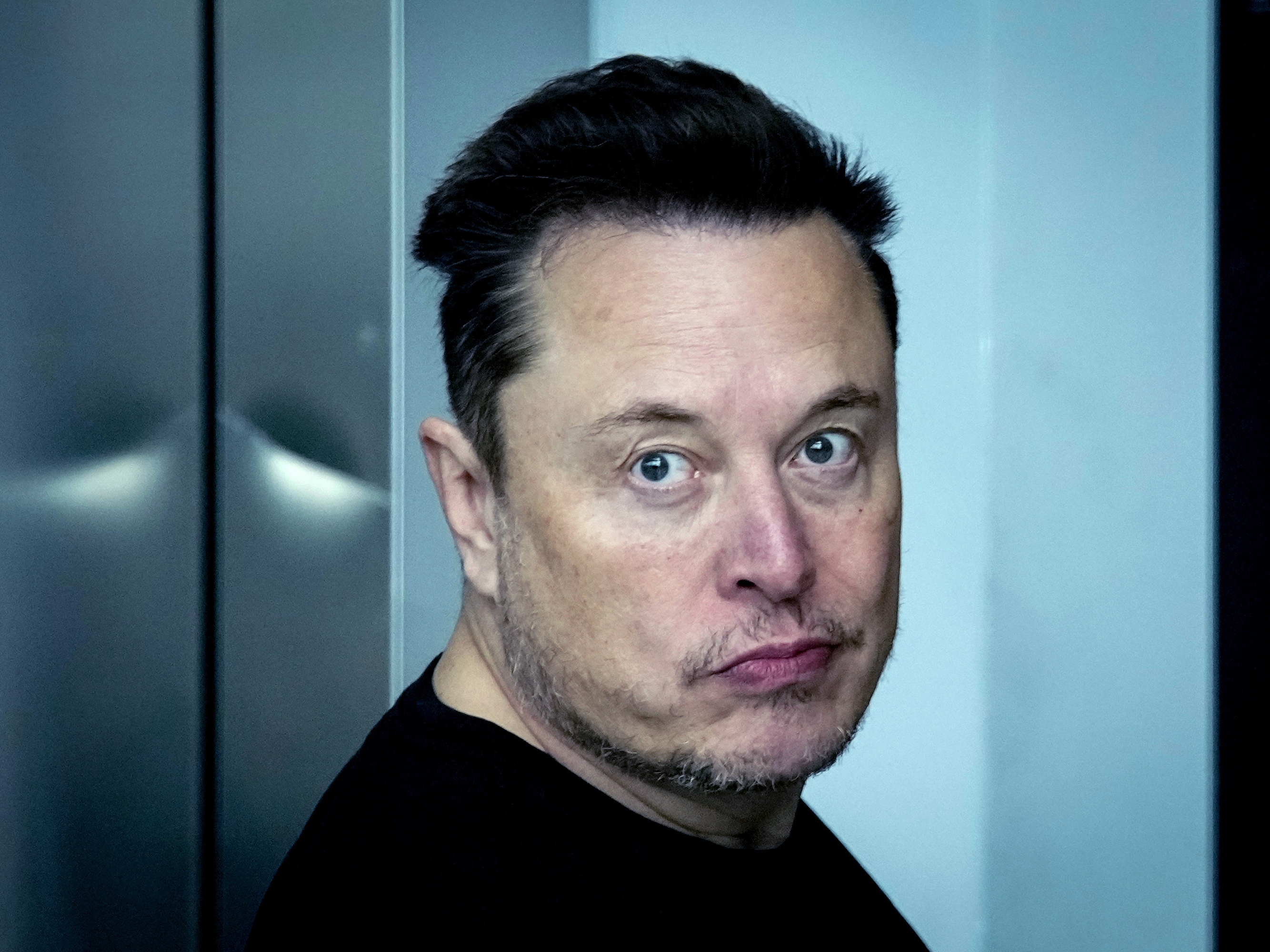 Tesla CEO Elon Musk leaves the Tesla Gigafactory for electric cars after a visit in Gruenheide near Berlin on March 13, 2024. (AP)