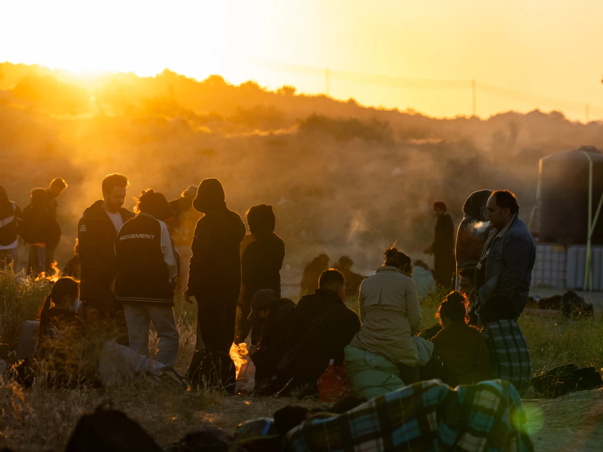 Migrants gather at an informal camp near Jacumba Hot Springs, California, on June 14, 2024. Once they cross the border into the U.S., they wait to be processed by U.S. Border Patrol, in their hope to claim asylum.
