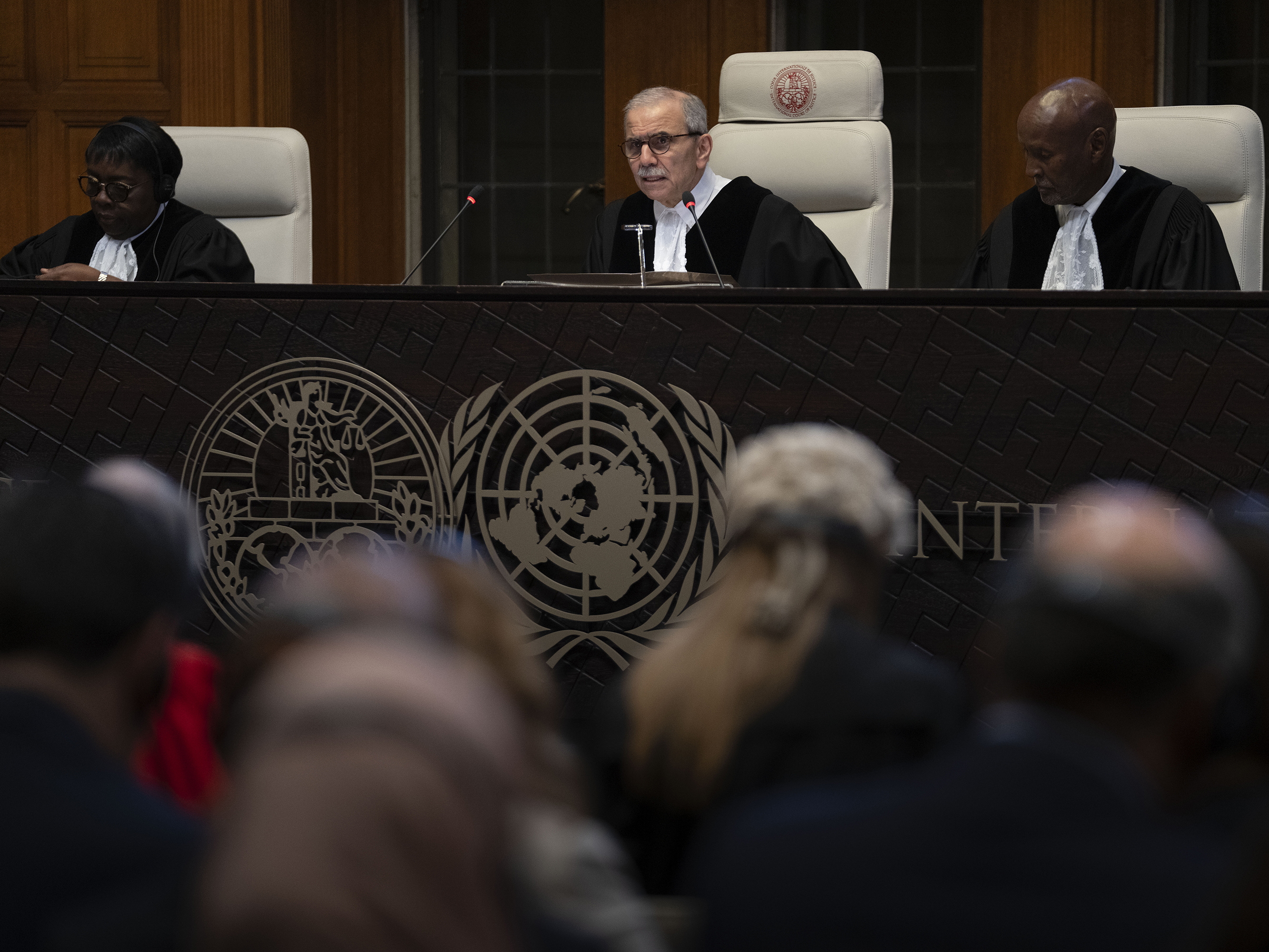 Presiding Judge Nawaf Salam reads the ruling of the International Court of Justice in The Hague, Netherlands, on Friday, May 24. The top United Nations court ruled on an urgent plea by South Africa for judges to order Israel to halt its military operations in Gaza and withdraw from the enclave.