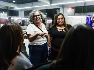 Fabiana de Oliveira (in the white top) is an activist with the National Network of Women Living with HIV,