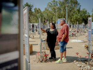 Meir and Kati Zohar stand together at the memorial marker dedicated to their daughter, Bar Zohar, at the Nova festival memorial site in southern Israel, on Sept. 24, 2026. Their daughter was among the victims killed on Oct. 7, 2023.