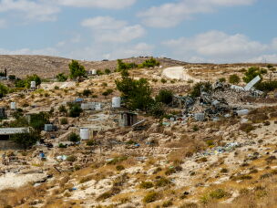 Rubble and the remains of demolished Palestinian homes and agricultural structures lie scattered across a hillside in Masafer Yatta, in the Israeli-occupied West Bank, on Sept. 24, 2026.