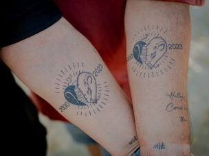Meir and Kati Zohar display matching memorial tattoos featuring the birth year and zodiac sign of their daughter, Bar Zohar.