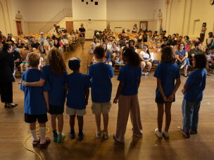 Principal Nichole Sakellarion greets families new to Micheltorena Street Elementary School and introduces some of the fifth-grade