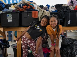 Sisters Angela and Gloria Calix at the New Orleans Free Store, in the lower ninth ward of New Orleans, La. on Aug. 20, 2026.