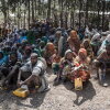 Ethiopians wait for their ration of food supplies in February. The U.N.'s World Hunger Programme reports that "nearly 16 million people are food insecure because of drought, floods, desert locusts, COVID-19, conflict and economic shocks." The famine in Ethiopia in the mid-1980s was the impetus for the establishment of FEWS NET, a U.S.-funded famine alert project.