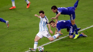 Argentina's Lionel Messi scores his team's second goal during the group F World Cup soccer match against Bosnia in Rio de Janeiro, June 15, 2014.