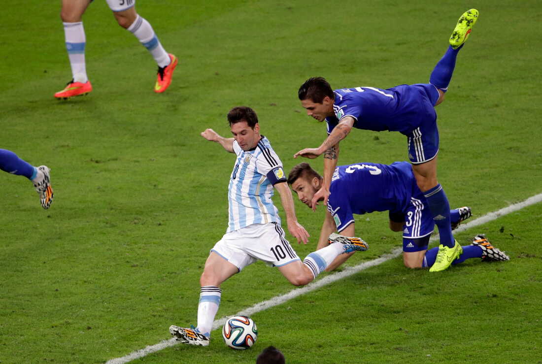 Argentina's Lionel Messi scores his team's second goal during the group F World Cup soccer match against Bosnia in Rio de Janeiro, June 15, 2014.