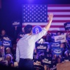 Sen. Jon Ossoff, D-Ga., waves to attendees during a reelection campaign event in Atlanta on Feb. 7.