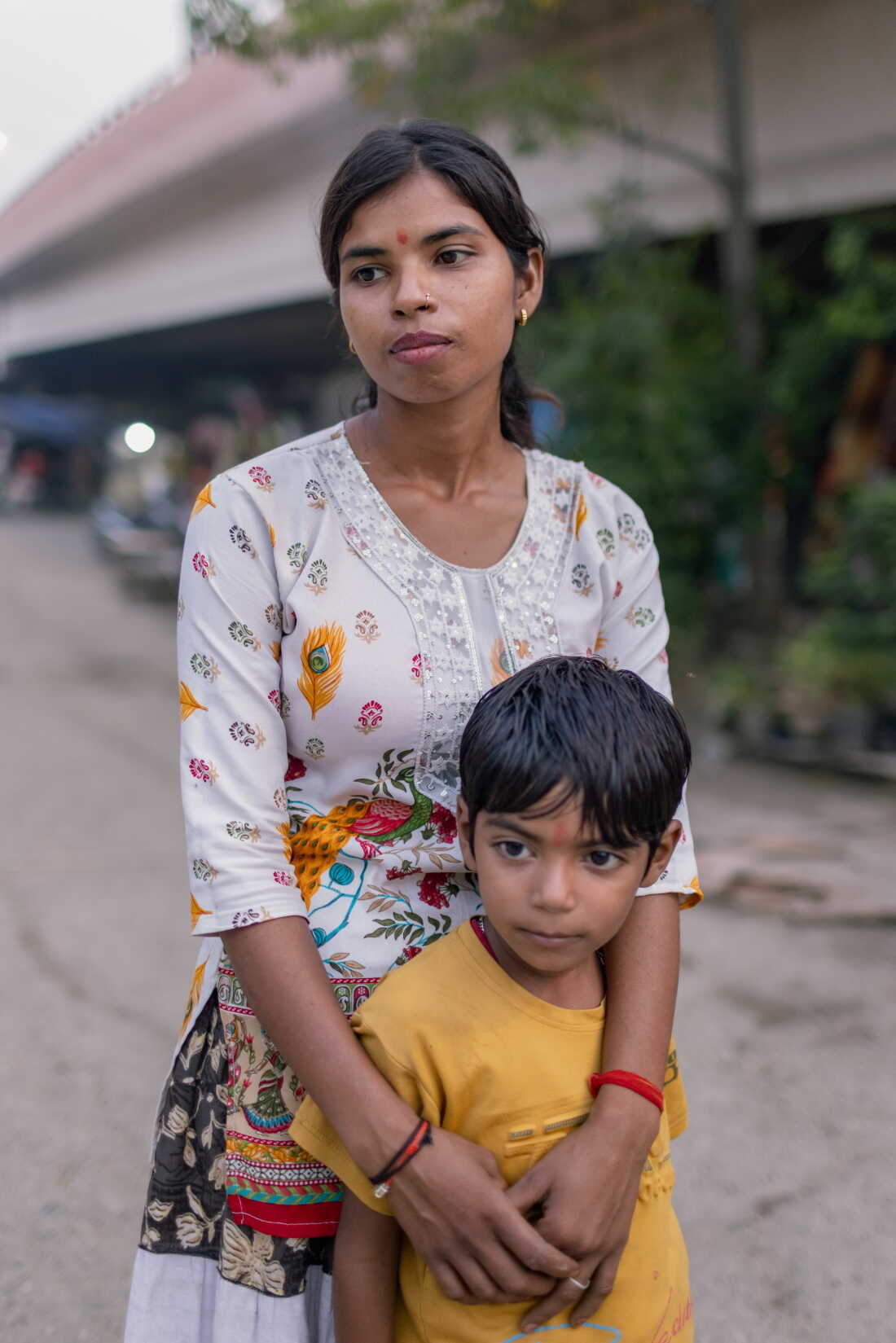 NEW DELHI, INDIA - OCTOBER 13, 2026: Kanchan and her son pose at home in the Muslim-majority neighborhood Bela Slum in New Delhi, India, October 13, 2026. Kanchan was deleted in the Special Intensive Revision (SIR) draft roll due to permanent relocation after his house was demolished.