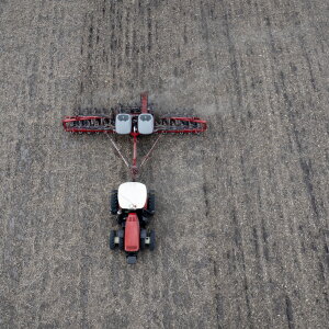 DWIGHT, ILLINOIS - APRIL 28: In this aerial view, Dan Duffy uses a tractor to plant soybeans on land he farms with his brother on April 28, 2025 near Dwight, Illinois.