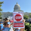 People opposed to a congressional redistricting plan rally outside the Missouri Capitol in Jefferson City, Mo., earlier this month.