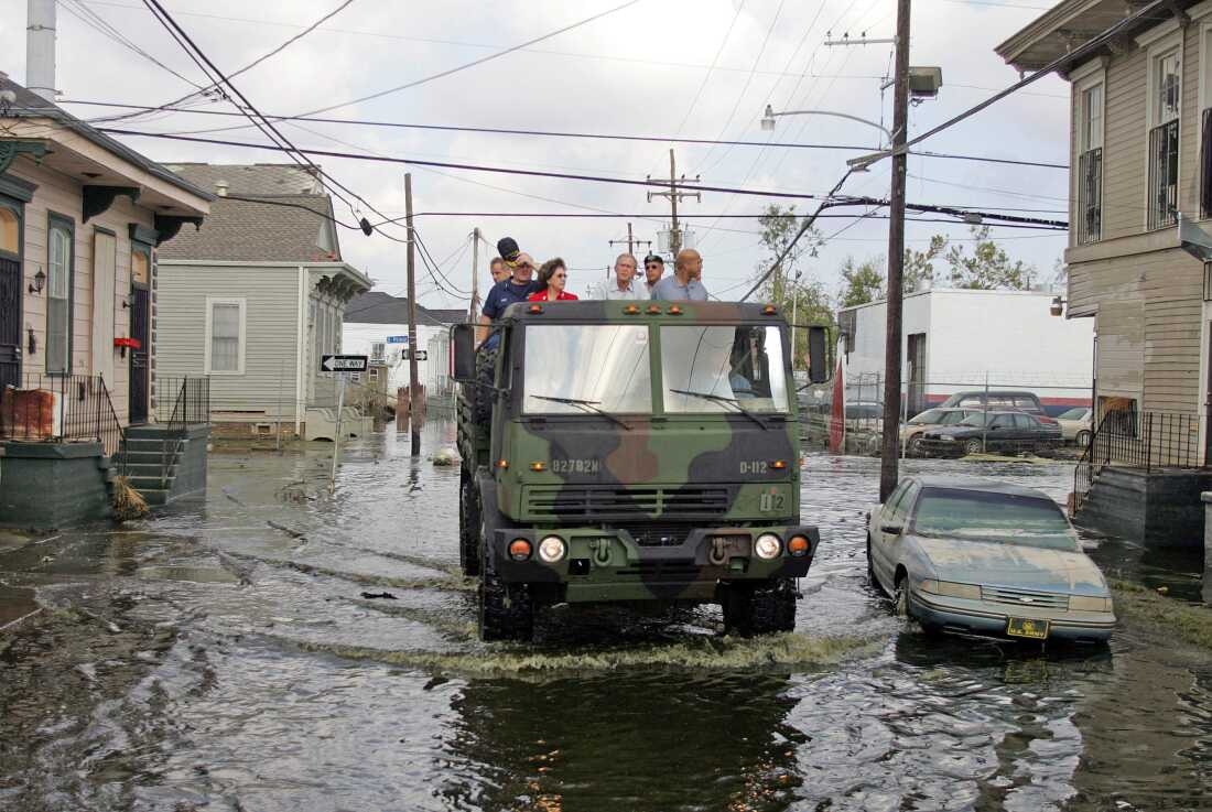 US President George W. Bush (C), Mayor Ray Nagin (R), Lousiana Governor Kathleen Blanco (2nd L) and Vice Admiral Thad Allen (L) tour through an area of New Orleans, Louisiana, where the flood waters recently receeded 12 September 2005. It will be months before it can call itself "The Big Easy" again, but New Orleans is slowly edging back from the brink as it enters its third week since Hurricane Katrina unleashed her fury. But entire neighborhoods are still stewing in a quagmire of mud and foul floodwater that in some cases almost reach up to rooftops. Some suburbs have been obliterated and the death toll, though lower than feared, still climbs steadily.