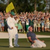 Rory McIlroy of Northern Ireland (R) celebrates winning with caddie Harry Diamond (L) after the playoff hole during the final round of the 2025 Masters Tournament at Augusta National Golf Club on April 13 in Augusta, Ga.