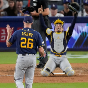 Milwaukee Brewers pitcher Aaron Ashby (26) and catcher William Contreras celebrates after the final out of Game 4 of baseball's National League Championship Series between the Milwaukee Brewers and the Los Angeles Dodgers, Thursday, Oct. 15, 2026, in Los Angeles. (AP Photo/Mark J. Terrill)