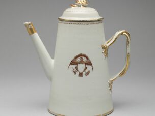 A coffeepot with cover, circa 1795. It has an American eagle motif, made in China for the American market. Coffee was part of a growing trend of globalization in the colonial era.