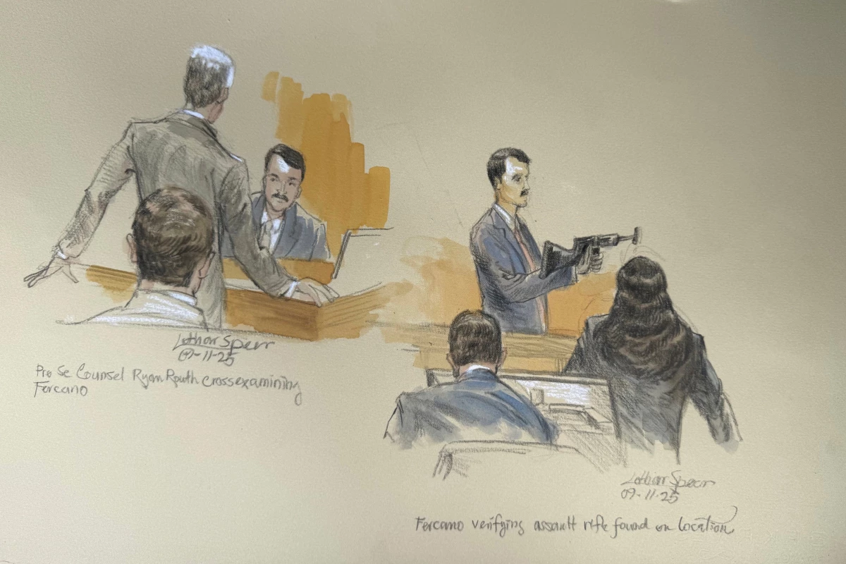 This courtroom sketch shows Secret Service agent Robert Fercano holding up the weapon found in the bushes during opening statements Sept. 11, 2025 in the trial of Ryan Routh, who is charged with attempting to assassinate Donald Trump last year at a golf course in West Palm Beach, Fla.