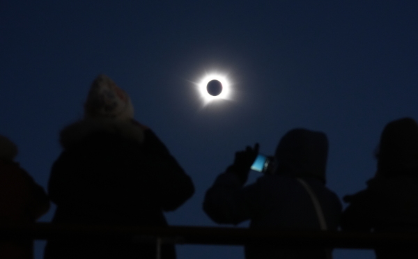 A view of the total eclipse, as the Moon passes between the Earth and the Sun, as seen from on board the Ambassador cruise ship Ambition, off the coast of Greenland.