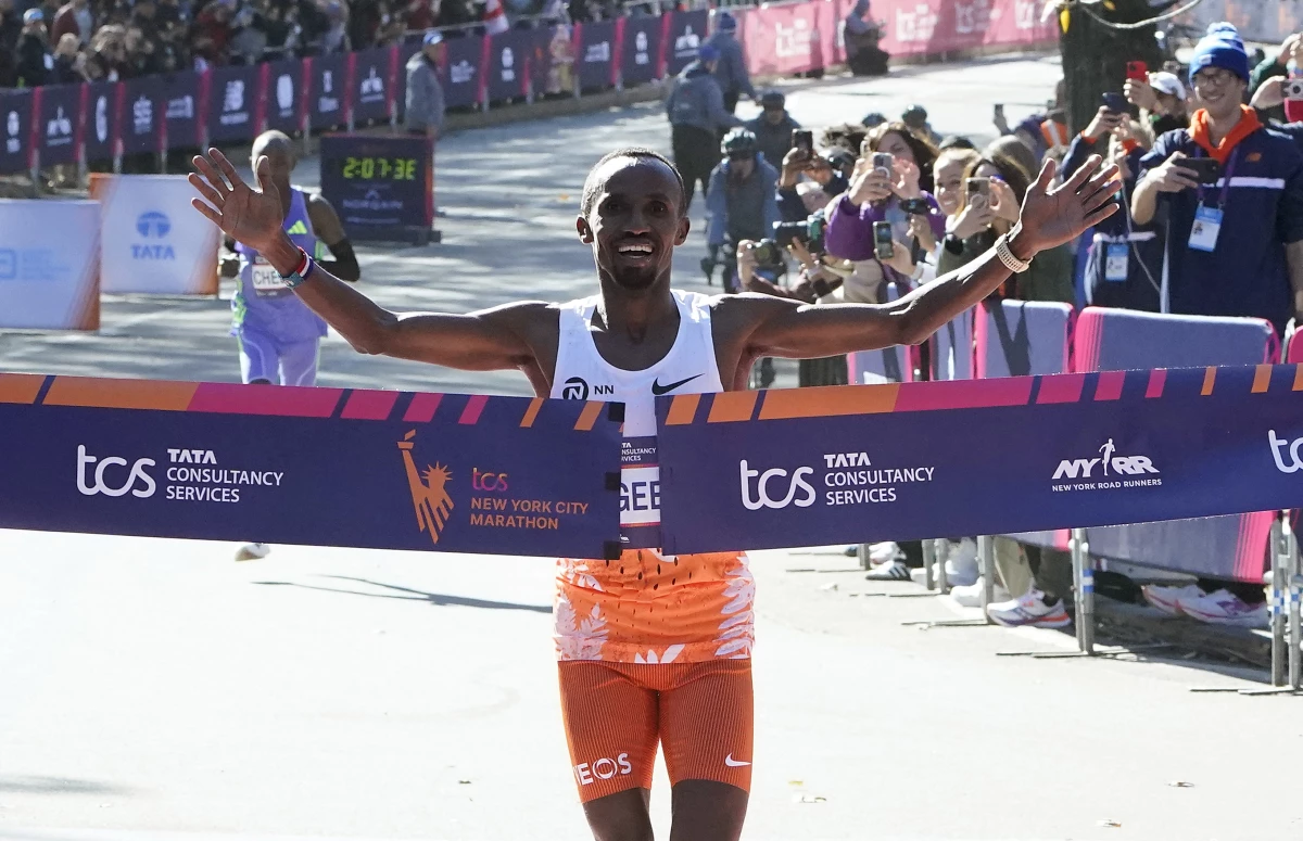 Abdi Nageeye of the Netherlands crosses the finish line to win the men's division during the New York Marathon in New York City on Sunday.