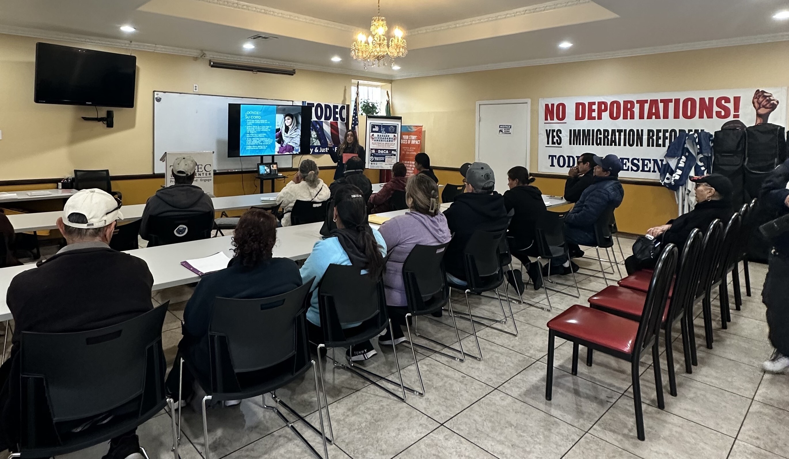 Attendees listen as a TODEC staffer conducts a legal rights training in Perris, Calif. on Jan. 28. (NPR)