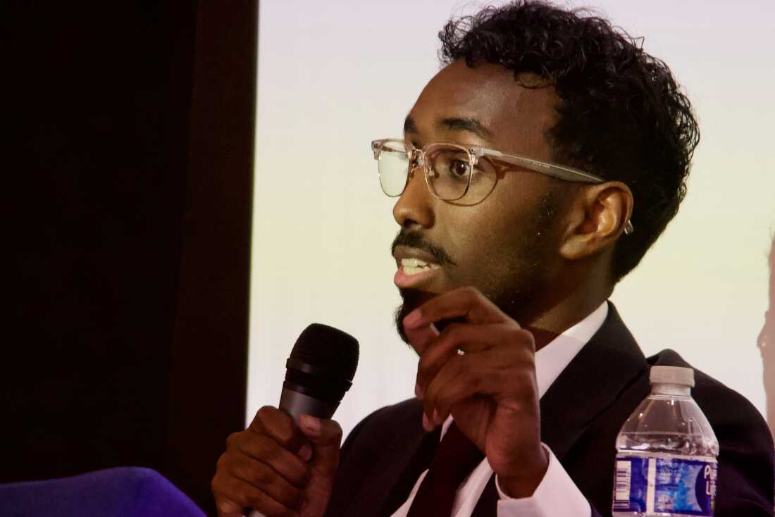 Liban Mohamed won more than 51% of the delegates at the Utah Democratic Party's nominating convention in April, though the primary will decide the final nominee. In this file photo, Mohamed speaks on a panel of candidates running to represent Utah's new Democratic-leaning congressional district in Taylorsville, Utah on March 21.