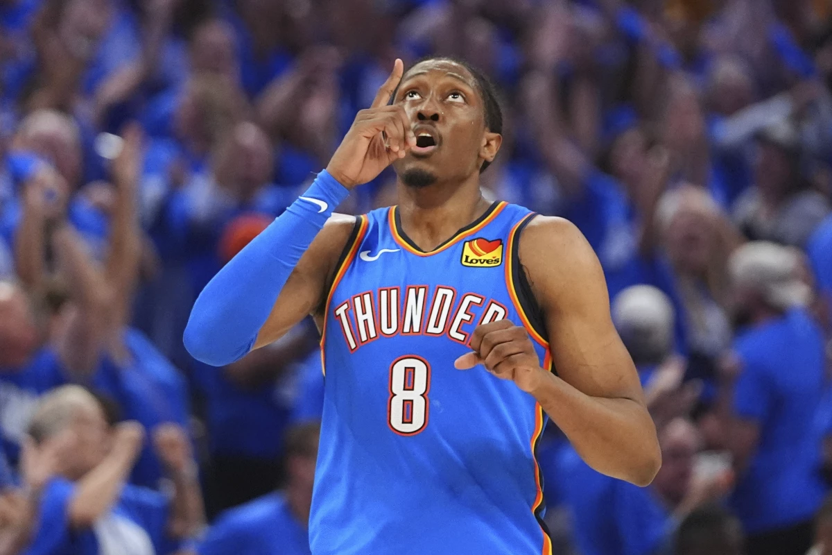 Oklahoma City Thunder forward Jalen Williams reacts after making a 3-pointer during the second half of Game 7 of the NBA Finals against the Indiana Pacers on Sunday. The Thunder defeated the Pacers to win their first NBA title since moving to Oklahoma City.