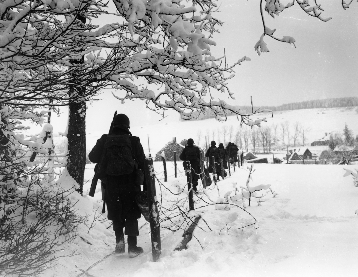 U.S. Army troops march through Belgium on Jan. 25, 1945, during the Battle of the Bulge.