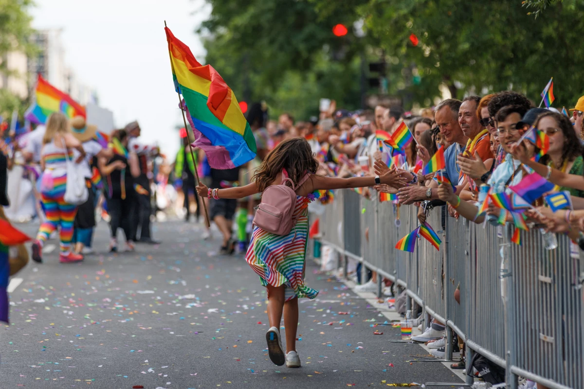 Participants march through the DC Pride Parade on Saturday, June 8, 2024 in Washington, District of Columbia in Logan Circle.