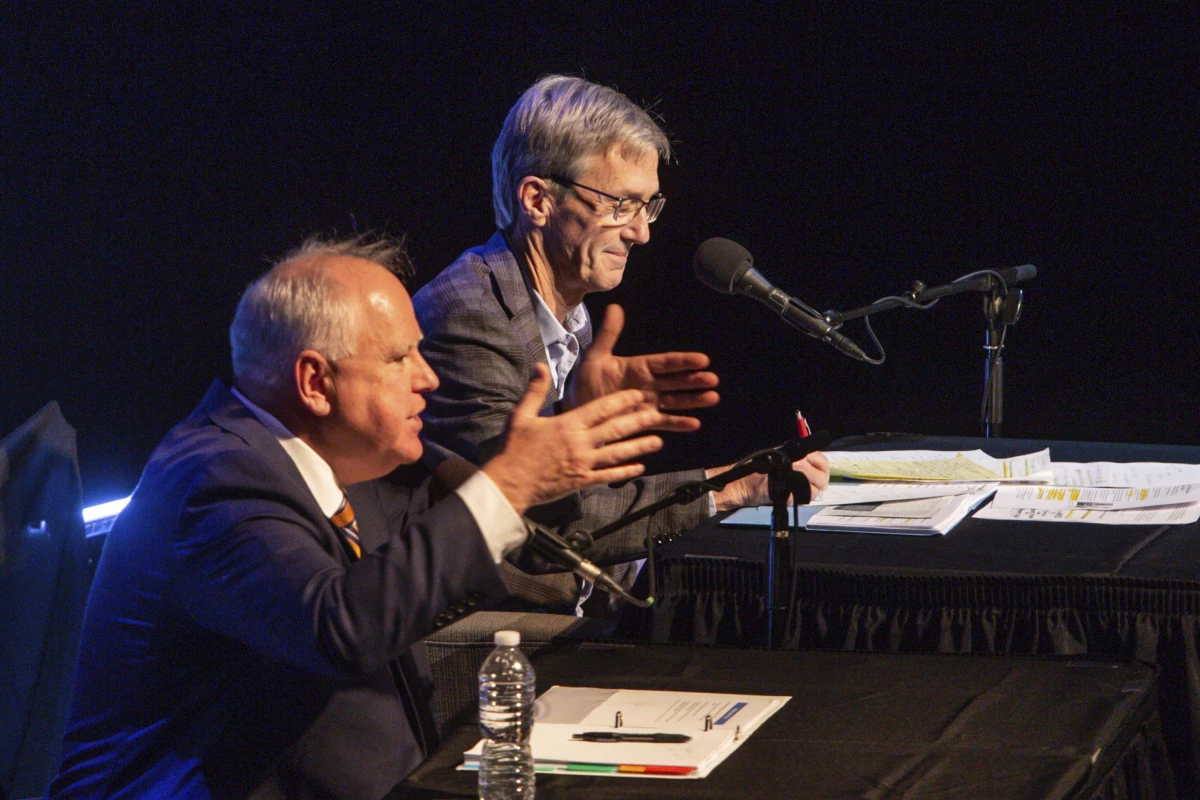 Minnesota Gov. Tim Walz (left) and gubernatorial candidate Scott Jensen engage in a gubernatorial debate at the Fitzgerald Theater on Oct. 28, 2022, in St. Paul.