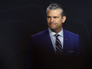 Secretary of Defense Pete Hegseth arrives on stage for a discussion during an annual Army meeting on October 14, 2026 in Washington, DC.