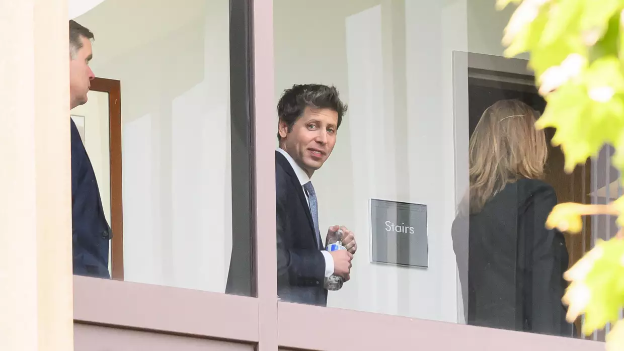 OpenAI CEO Sam Altman walks inside the federal courthouse during a recess in the proceedings in the trial over Elon Musk's lawsuit against OpenAI in Oakland, California, on May 12, 2026.